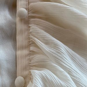 Long sleeve Ivory Topshop dress.